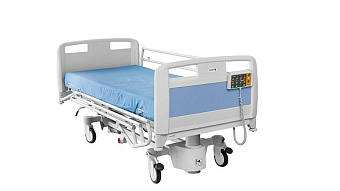 Детская больничная кровать с электрической регулировкой