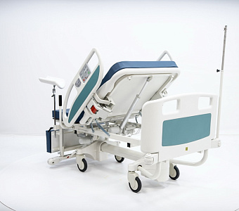Акушерская кровать для родовспоможения на телескопических колоннах