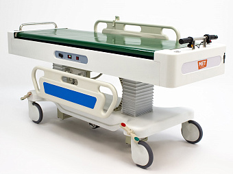 Тележка для перевозки больных c перекладывателем с моторизированным колесом