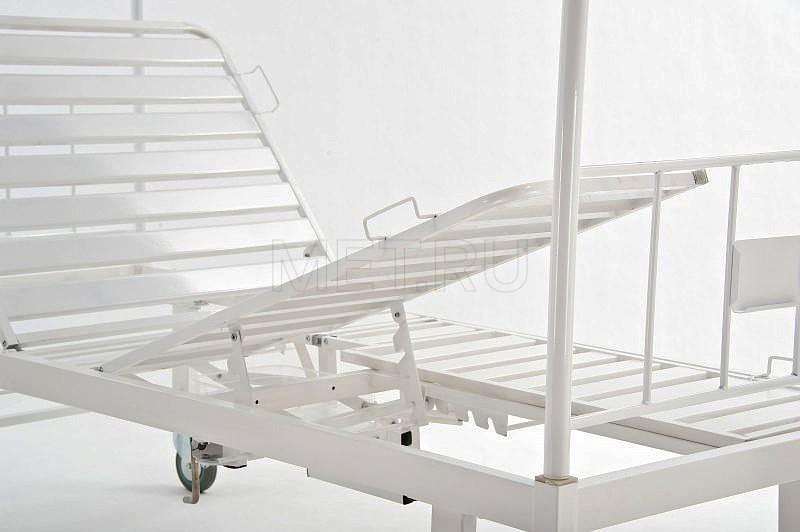 КМФ-942 тракционная Кровать с раздельными ножными секциями, тр. рамой и туалетом МЕТ