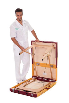 Складной массажный стол с поднимающимся сегментом ножной панели