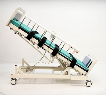 Электрическая четырёхсекционная кровать-вертикализатор с функцией переворачивания  и туалетом