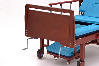 Кровать для лежачих больных с  функцией переворачивания больного  и туалетом