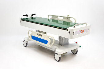 Тележка для перевозки больных c перекладывателем с моторизированным колесом